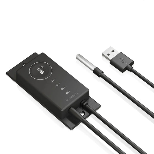 Black electronic device with USB cable on a white background