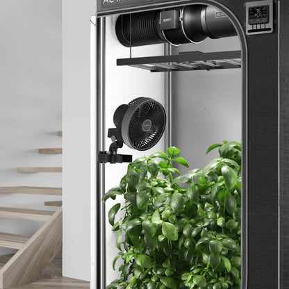 Gardening system with plants inside a cabinet, featuring ACDC brand on fans.