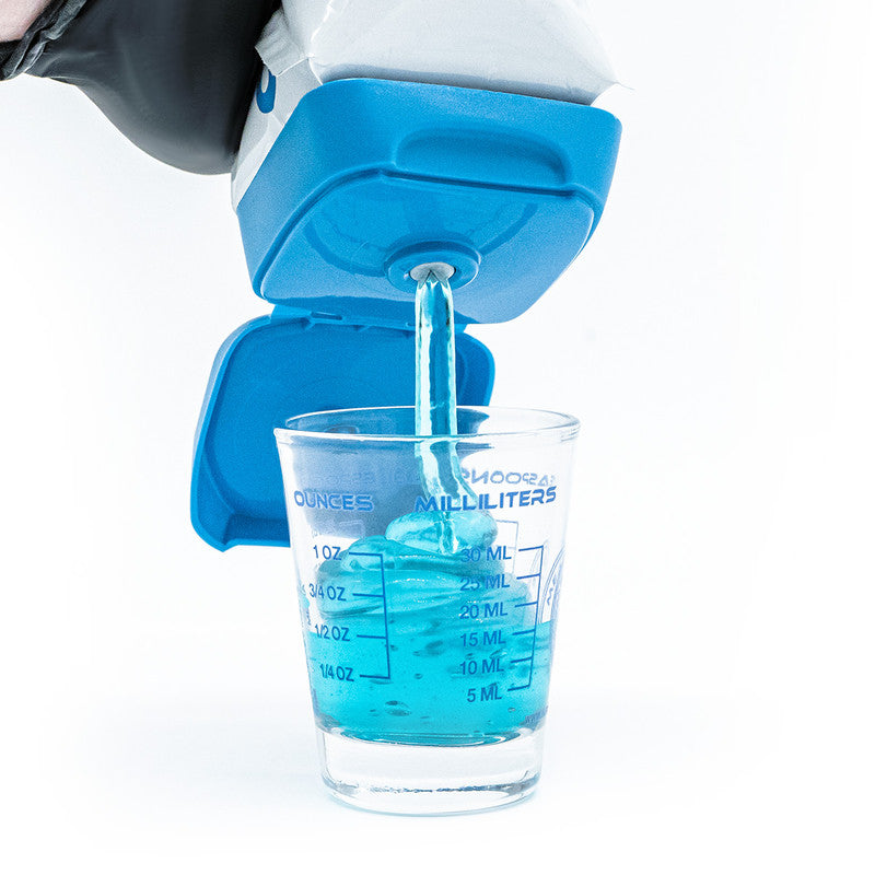 athena cuts being dispensed into a clear glass measuring cup